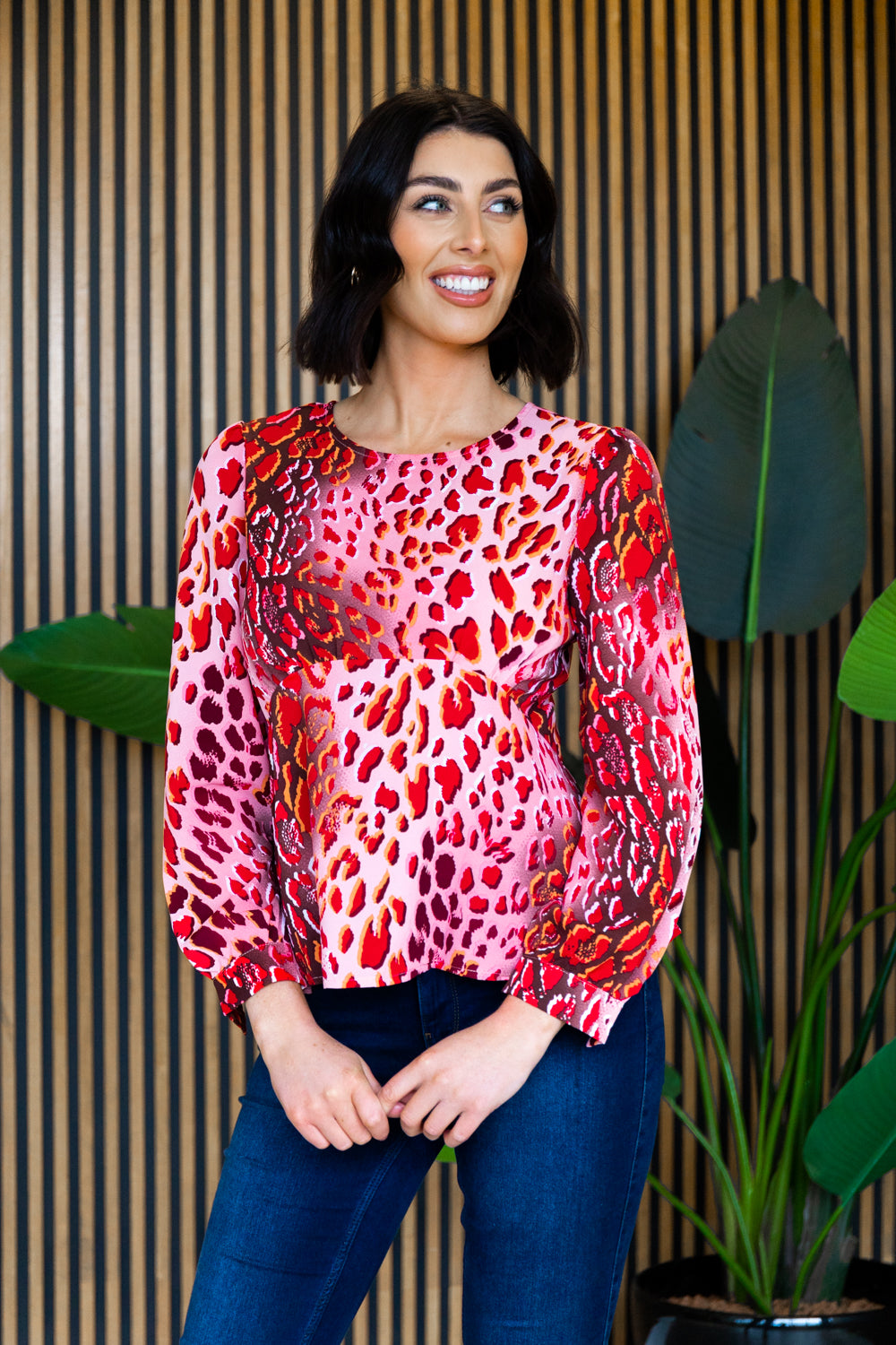 Emily & Me Joanne Red Animal Print Peplum top