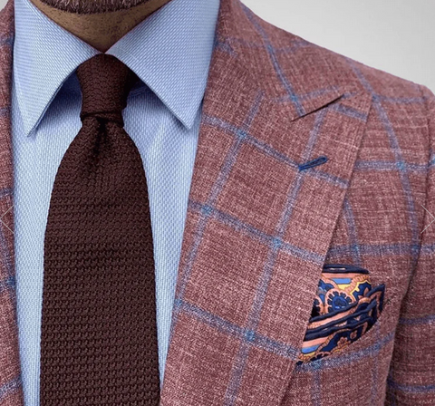 Nantucket Red plaid suit jacket with chocolate brown grenadine tie by the dark knot