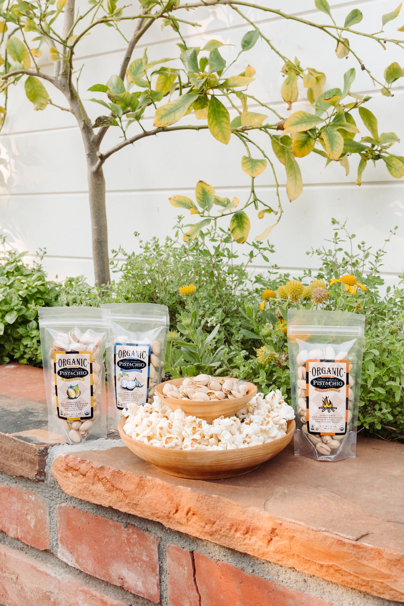 Santa Barbara Pistachios in multiple flavors, paired with artisanal SB popcorn