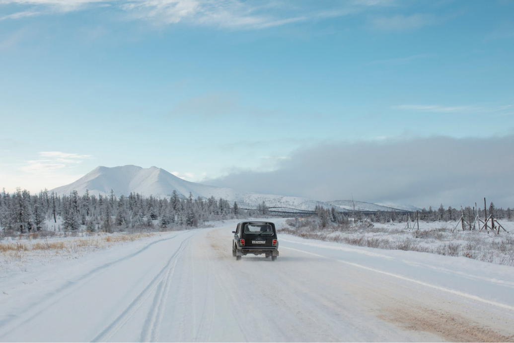 A Lada Niva driving along the Kolyma highway. Credit: Emile Ducke, New York Times