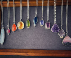 A rainbow of sterling silver necklace made with gemstones from opal to amethyst