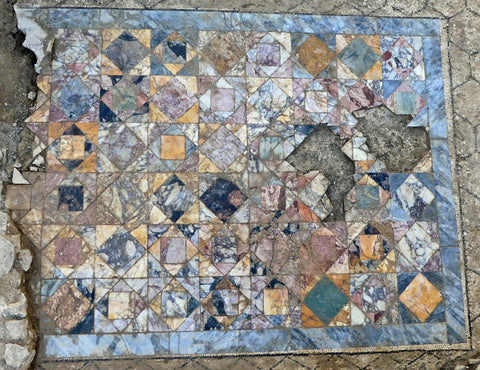 Ancient Roman tile in colorful hues being unearthed by archeologists