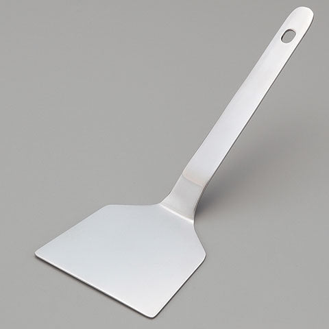 Accessories include a convenient stainless steel spatula