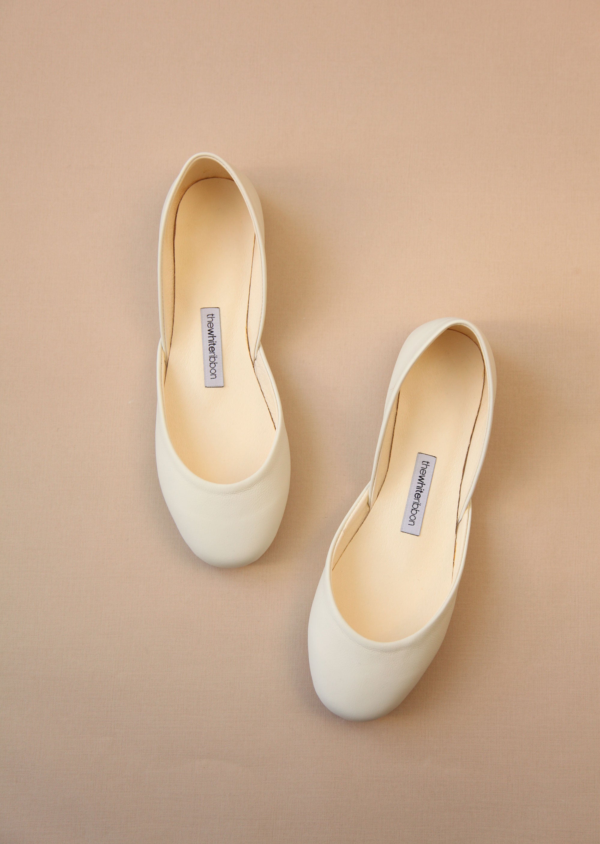 ivory ballerina flats