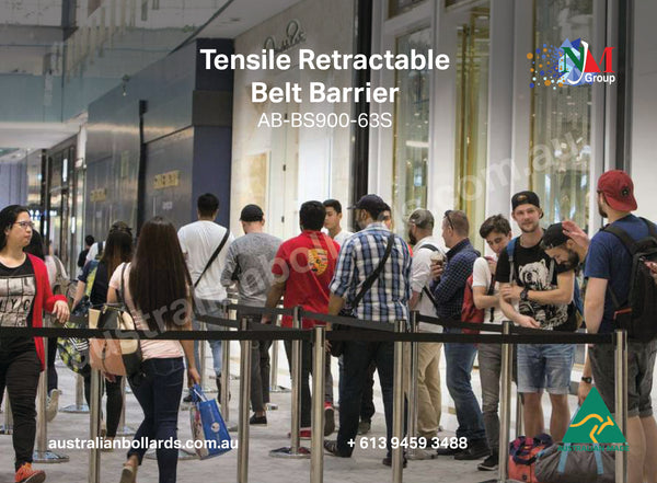 Tensile retractable barrier in use