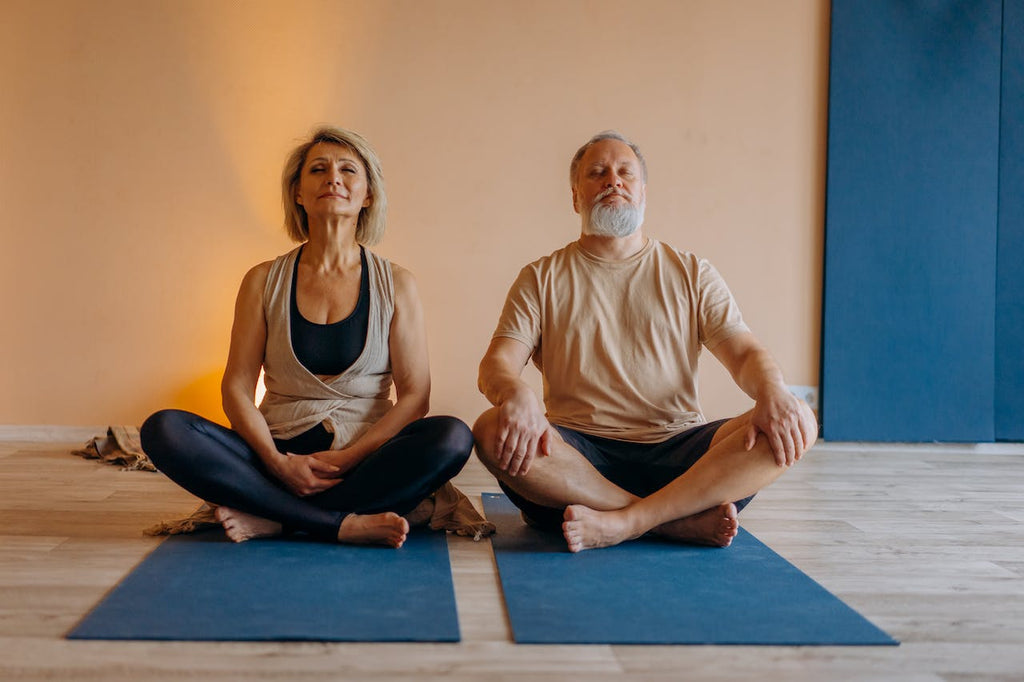 Two people meditating