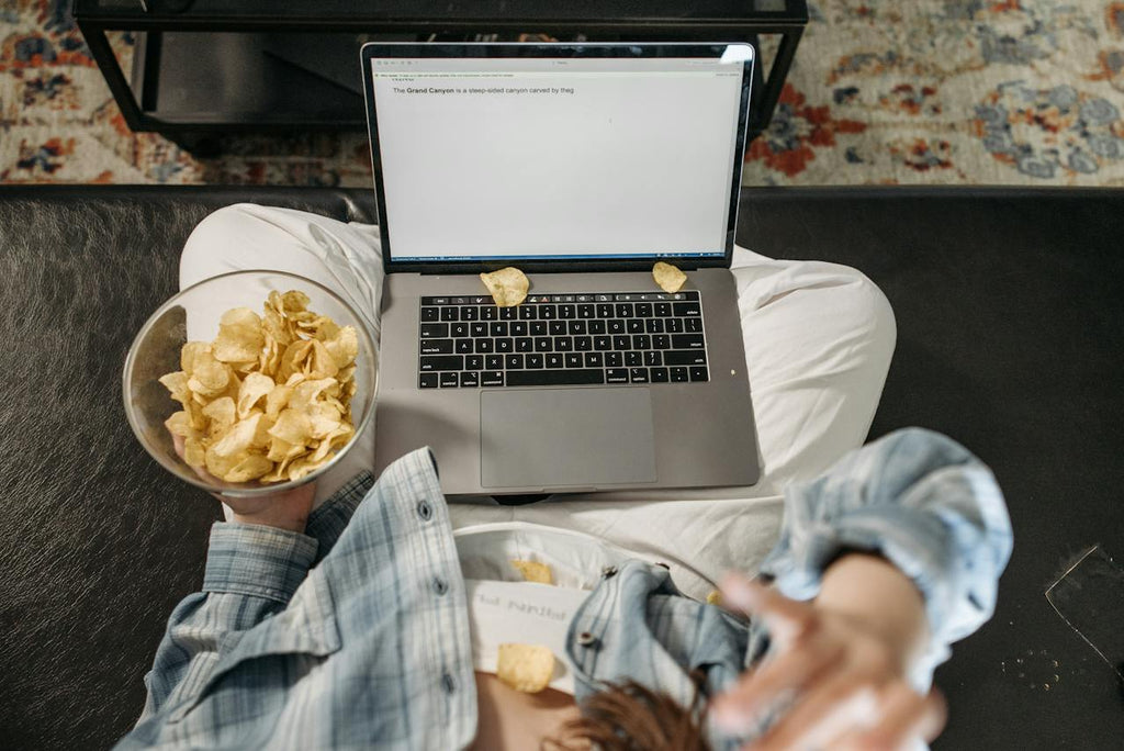 Eating chips while on computer