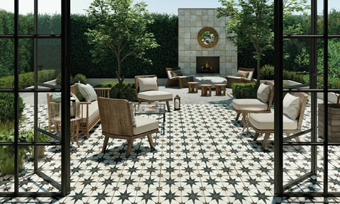 Peronda tiles FS Star victorian outdoor tile in garden setting with comfy garden chairs and outdoor fireplace.