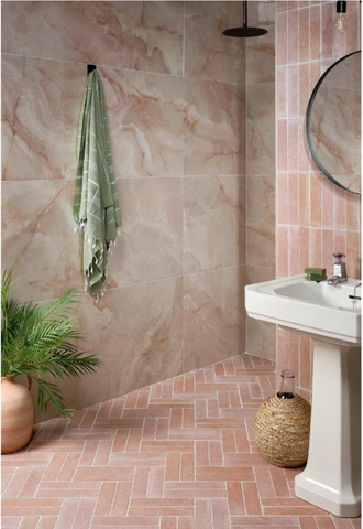 Ca' Pietra Medina Rose floor tile and wall tile in a bathroom setting. With California Rose tile 60x120cm on another wall