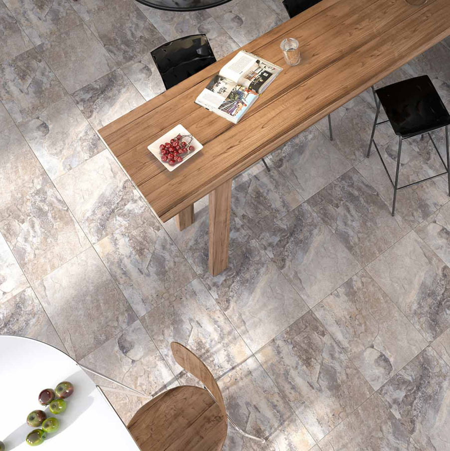 40x60cm Keystone Stone tile dining room floor with wooden table, white table, stools and fruit on the tables