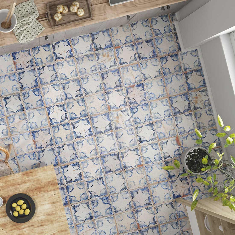 Peronda tile FS traditional cotswold rustic tile in a kitchen setting with kitchen door, worktop and part of a kitchen table. This vintage tile is on an aerial view.