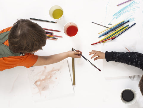 kids-painting-on-large-size-drawing-paper