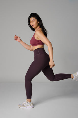 Turn up the HIIT in the Terra Bra (Ruby) and Cloud Classic Leggings (Plum)