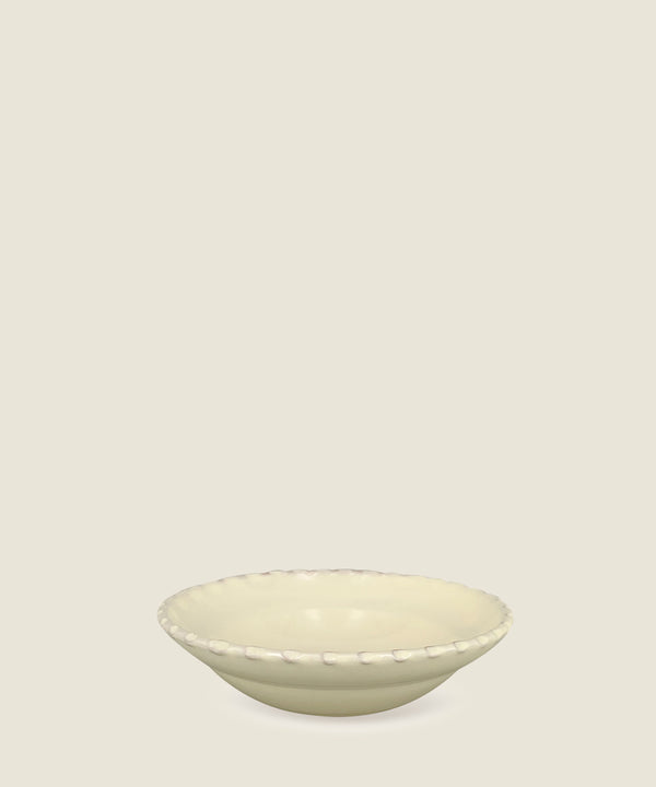 cream ceramic bowl