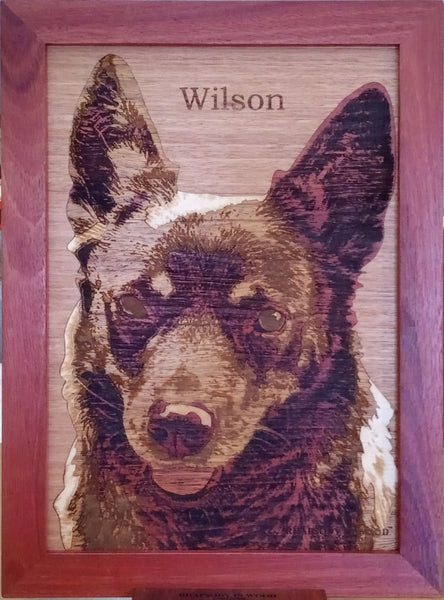Wooden portrait of a family dog 