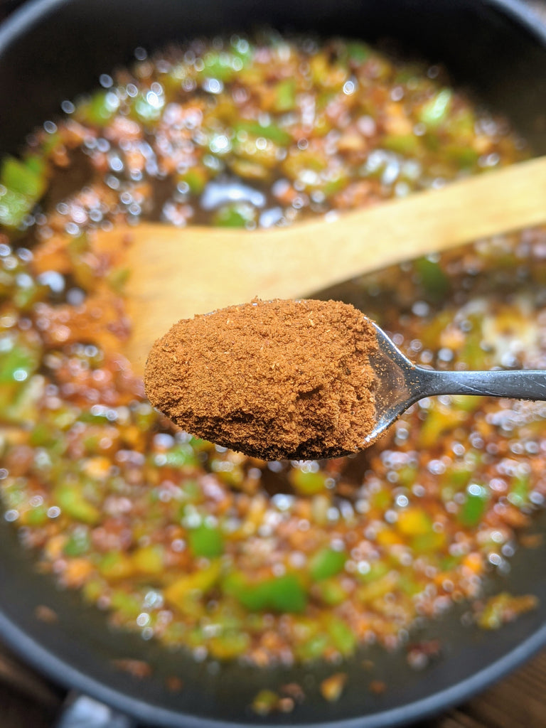 showcasing SpiceFix Pav Bhaji Masala to be added to the pan 