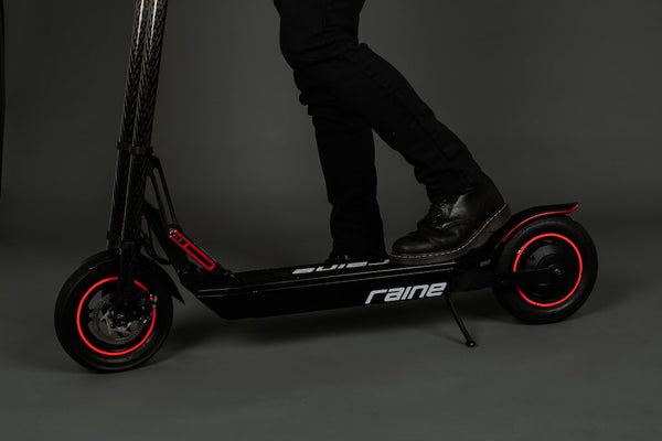 Person with Raine electric scooter