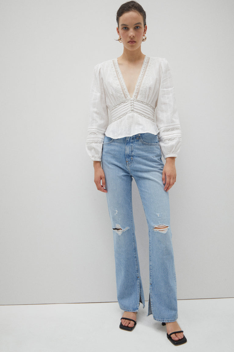 https://cdn.shopify.com/s/files/1/0350/3482/4836/products/distressed-bowery-frankie-ultra-high-rise-straight-leg-jeans-lookbook-view_767x1151_crop_center.jpg?v=1686165800