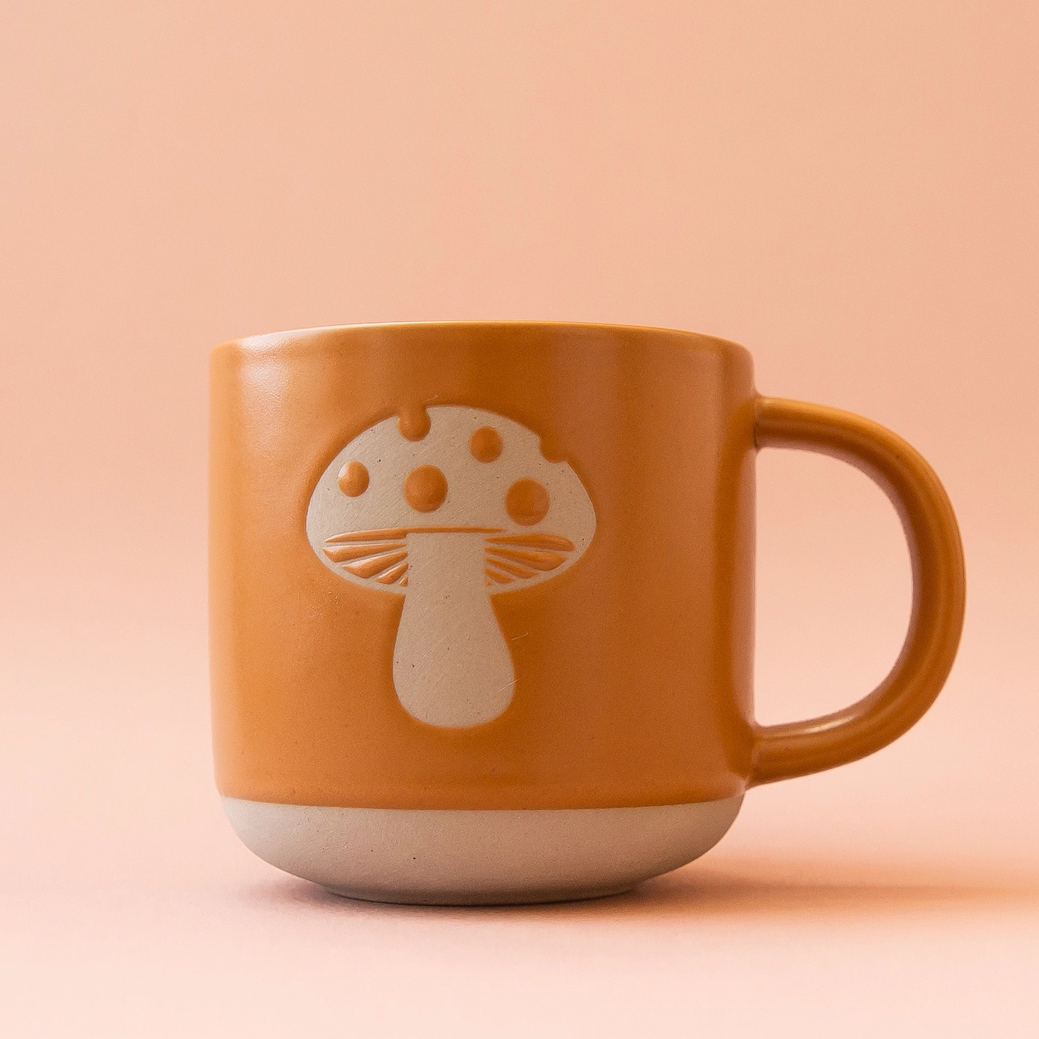 https://cdn.shopify.com/s/files/1/0350/5665/files/CY1A1724-4_mushroom-mug-rust.webp?v=1698343138&width=2048