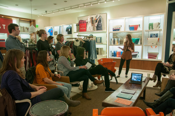 Julia Spangler speaking at a slow fashion event at Outpost