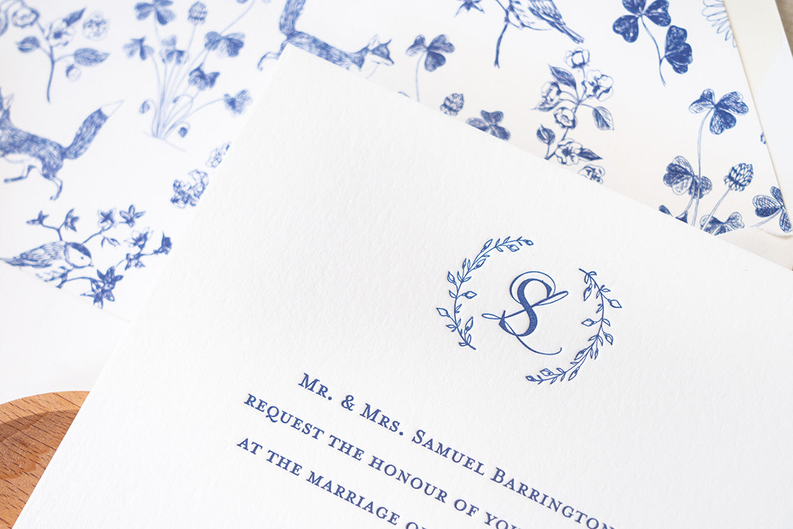 Custom letterpressed monogram wedding invite