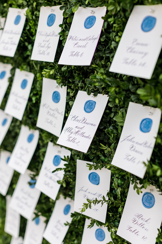 Wedding reception escort card display, wax seals