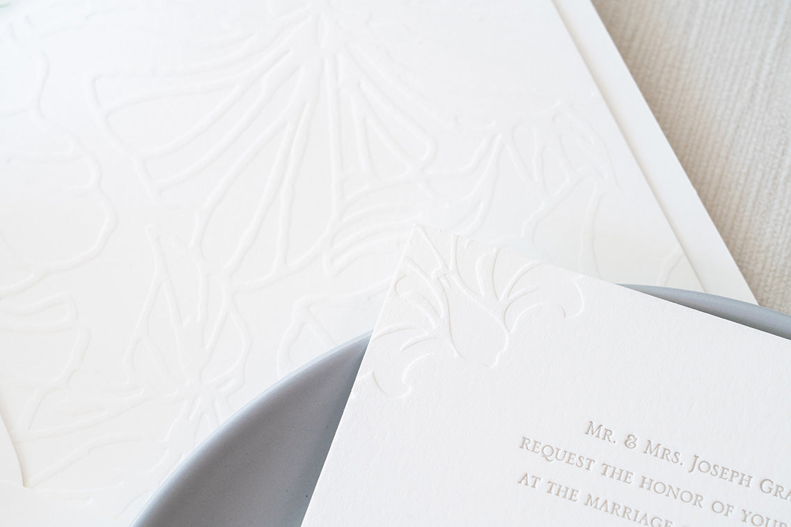 White on white blind letterpress floral ornamental design envelope liners for bespoke letterpress wedding invitations
