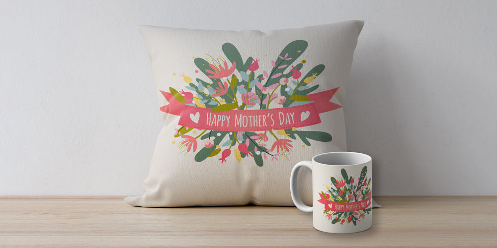 An Image of a Cushion and mug with mothers day theme