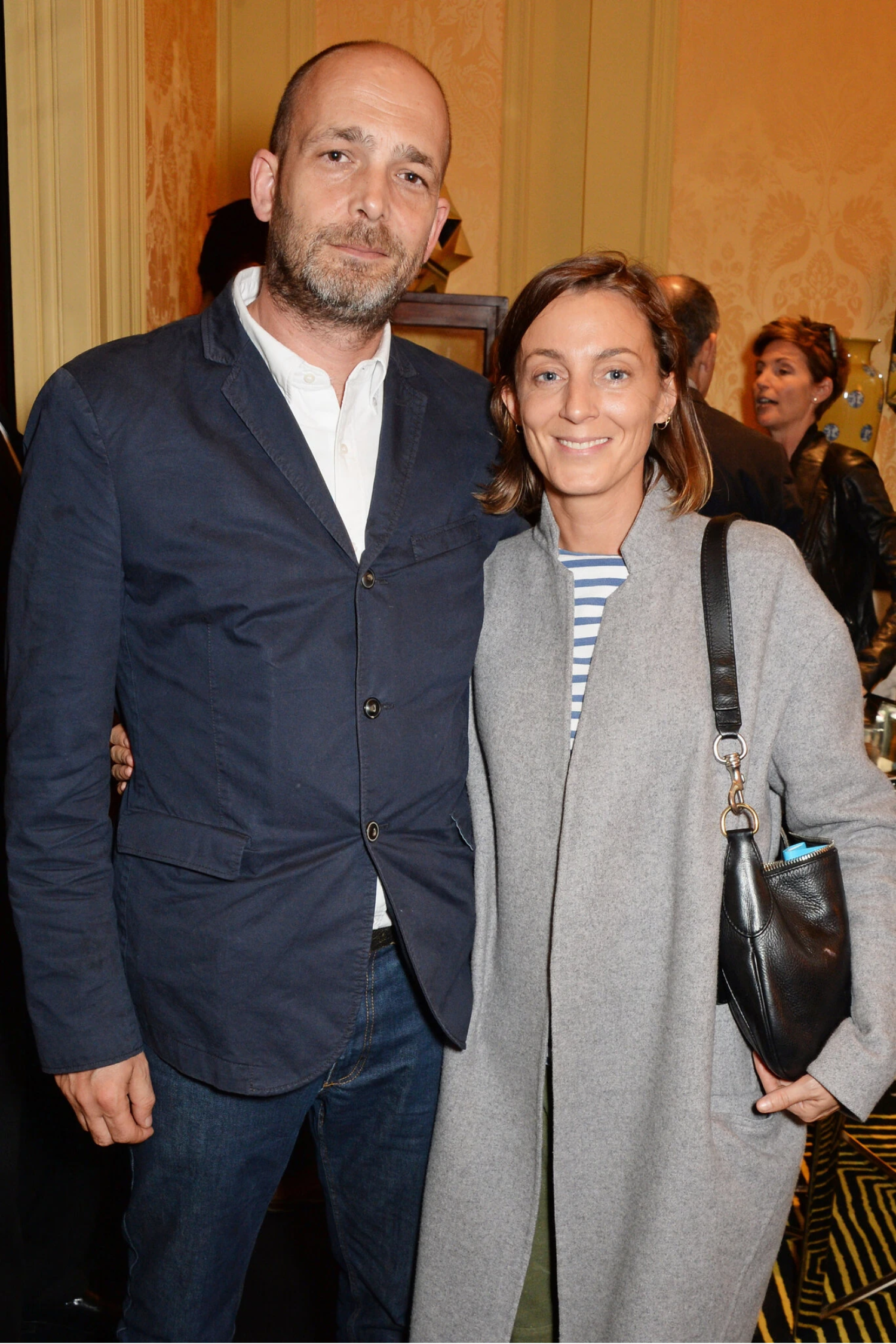 with her husband Max Wigram in London in 2014