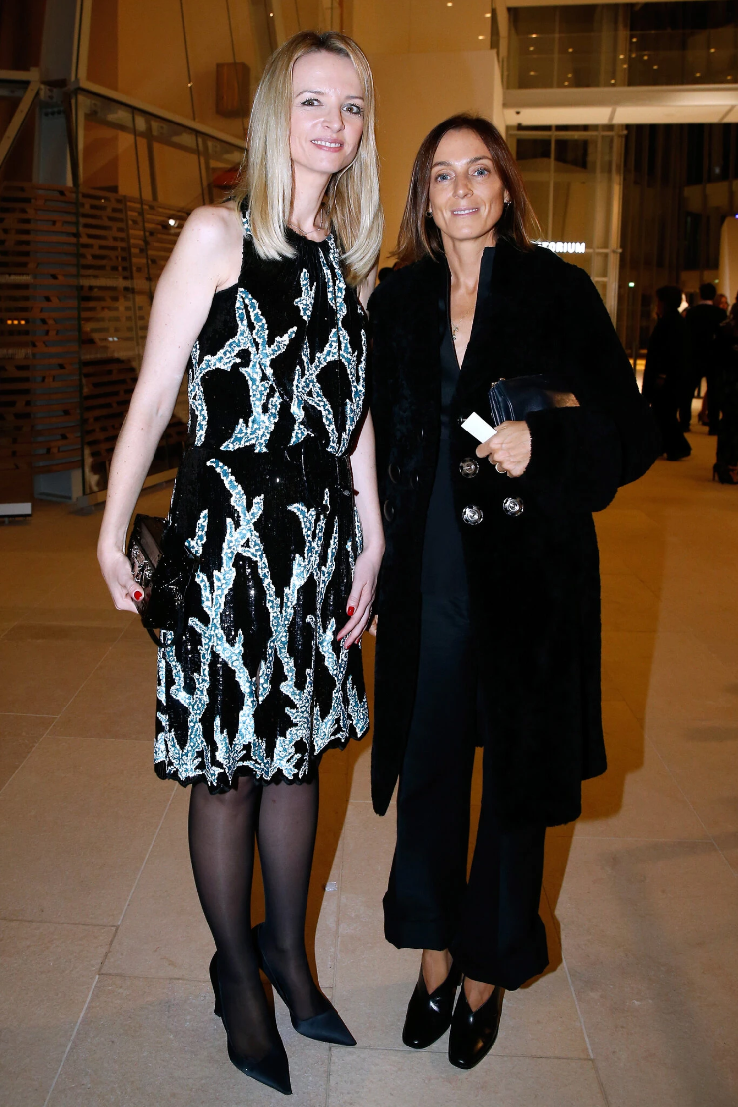 with Delphine Arnualt of LVMH at the opening of the Foundation Louis Vuitton in Boulogne-Billancourt, France, in 2014.