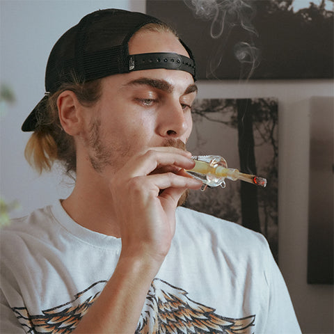 guy smoking lit joint