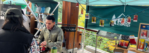 Outdoor Element Founder, Michael Mojica, demonstrating OE gear for prospective customers at REI's Founders' Market in 2022