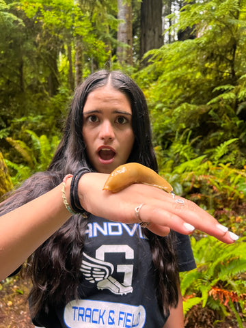 Holding a banana slug in Redwood National Park