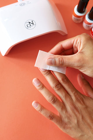 Cleaning nails with Cleanser Wipes