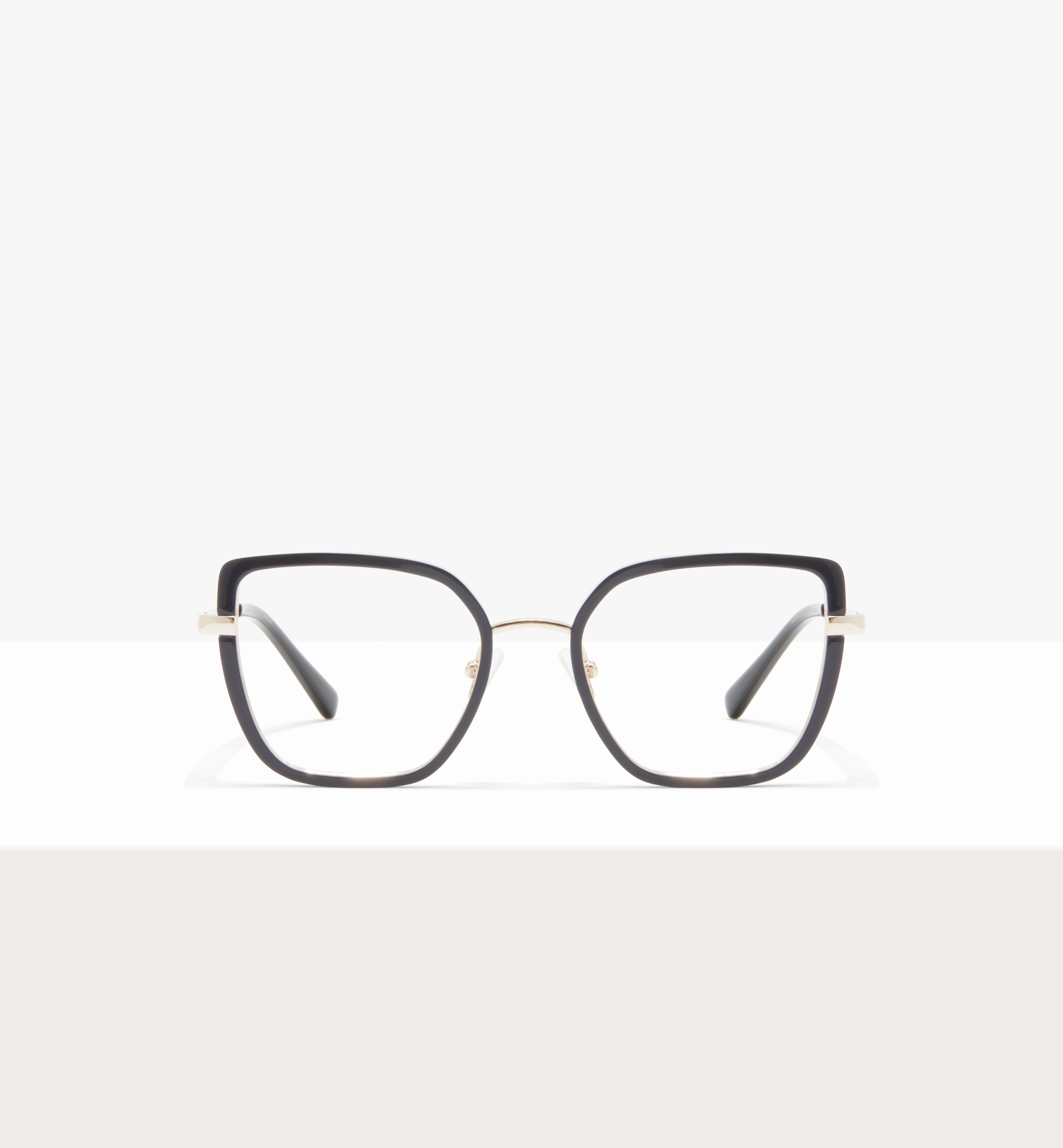 Black square glasses with thin gold accents on a white background.