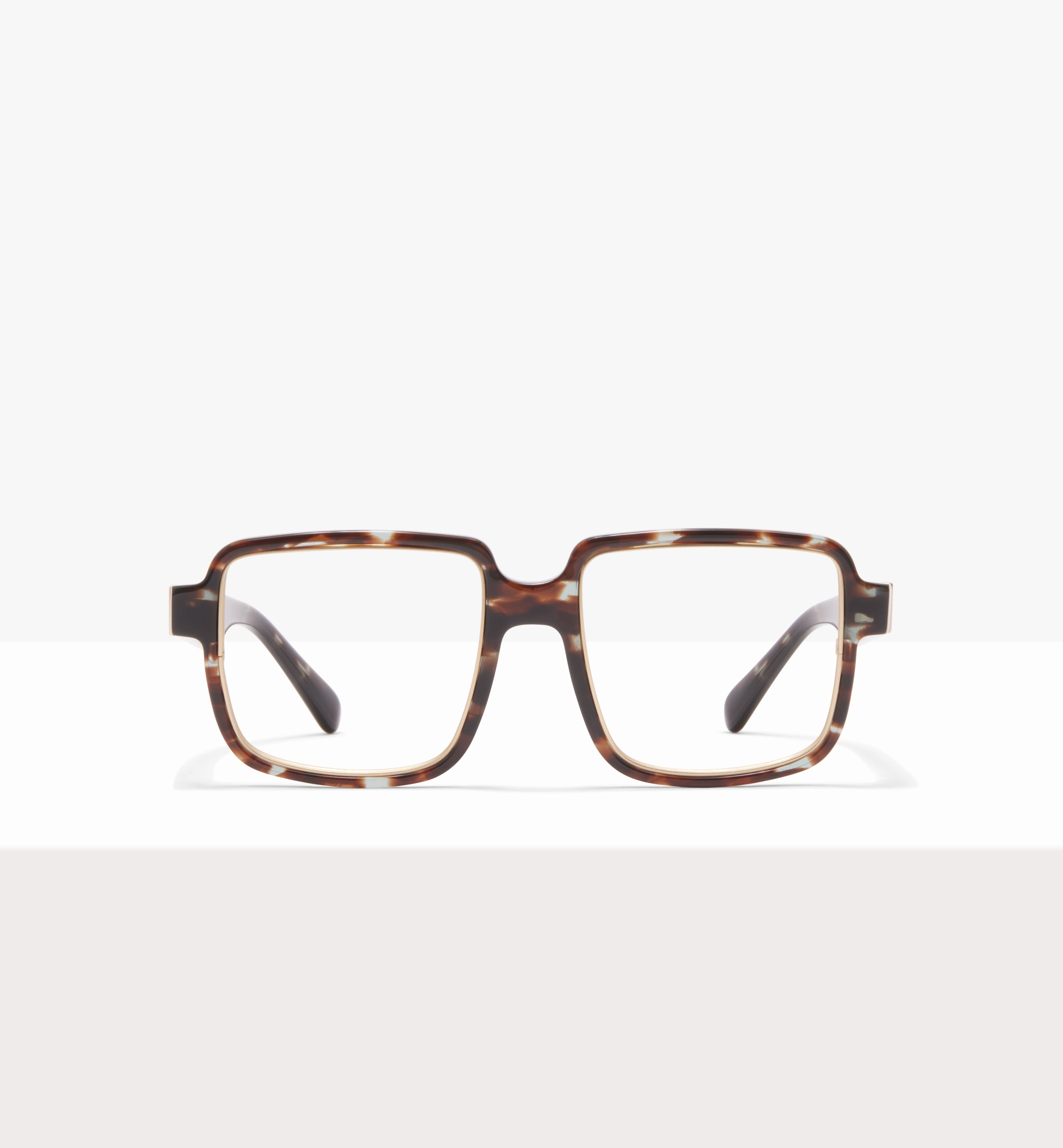 Rectangular tortoiseshell eyeglasses with clear lenses on a white background.