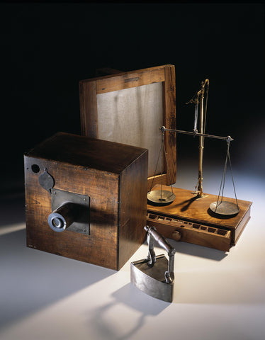 Fig. 6. Camera, printing frame, iron and balance, used by W.H.F. Talbot in the calotype process, 1840s. NMS.T.1936.21, .22, (C) National Museums Scotland 