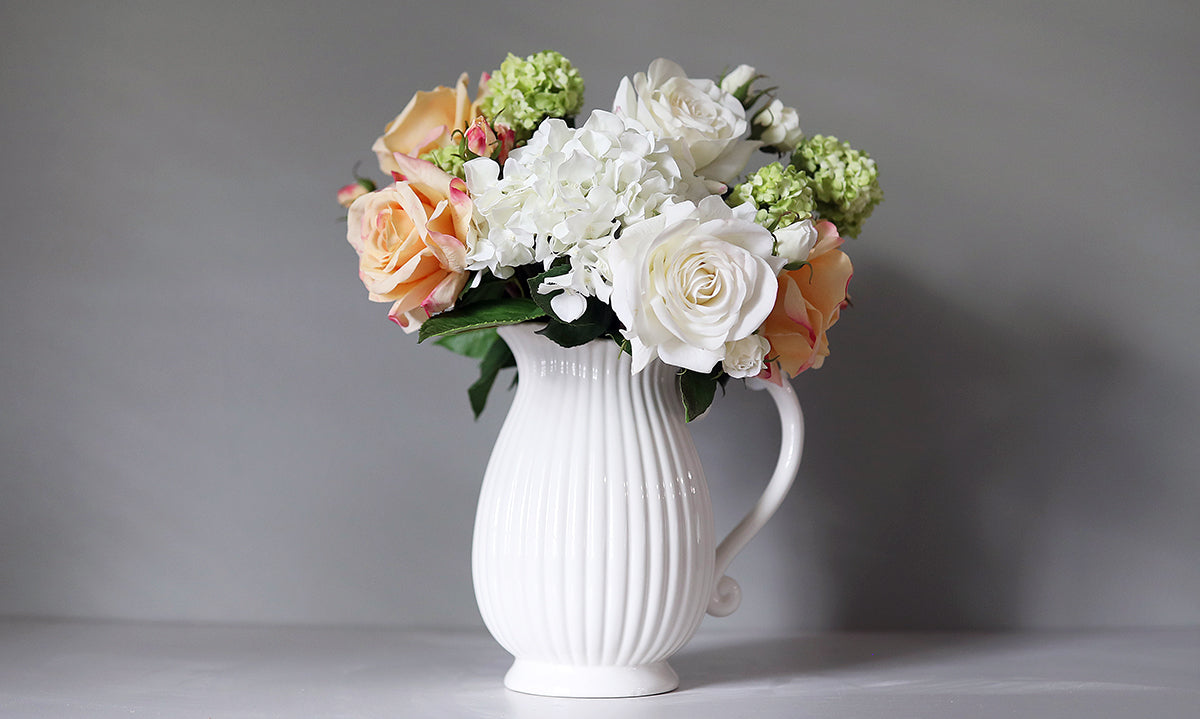 Real Touch Roses and Hydrangeas Arranged in Ceramic Pitcher