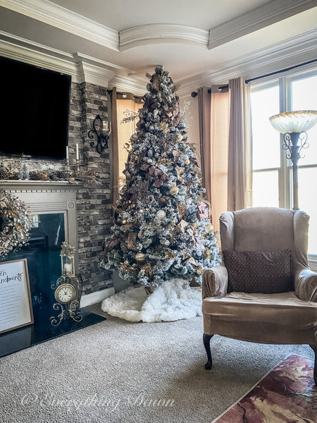 family room Christmas Tree trimmed in gold and silver
