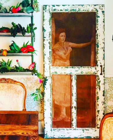 Colorful decor Door frame with art of a woman behind