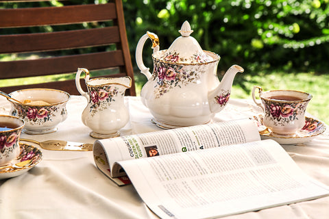 Tea Service with a magazine on a table