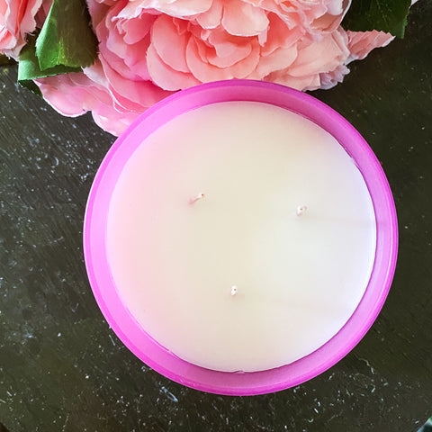 Colonial Candle Three Wick Container Pink with flowers surrounding