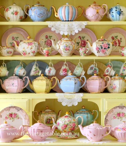mixed tea display on yellow shelving - whimsical kitchen focal point