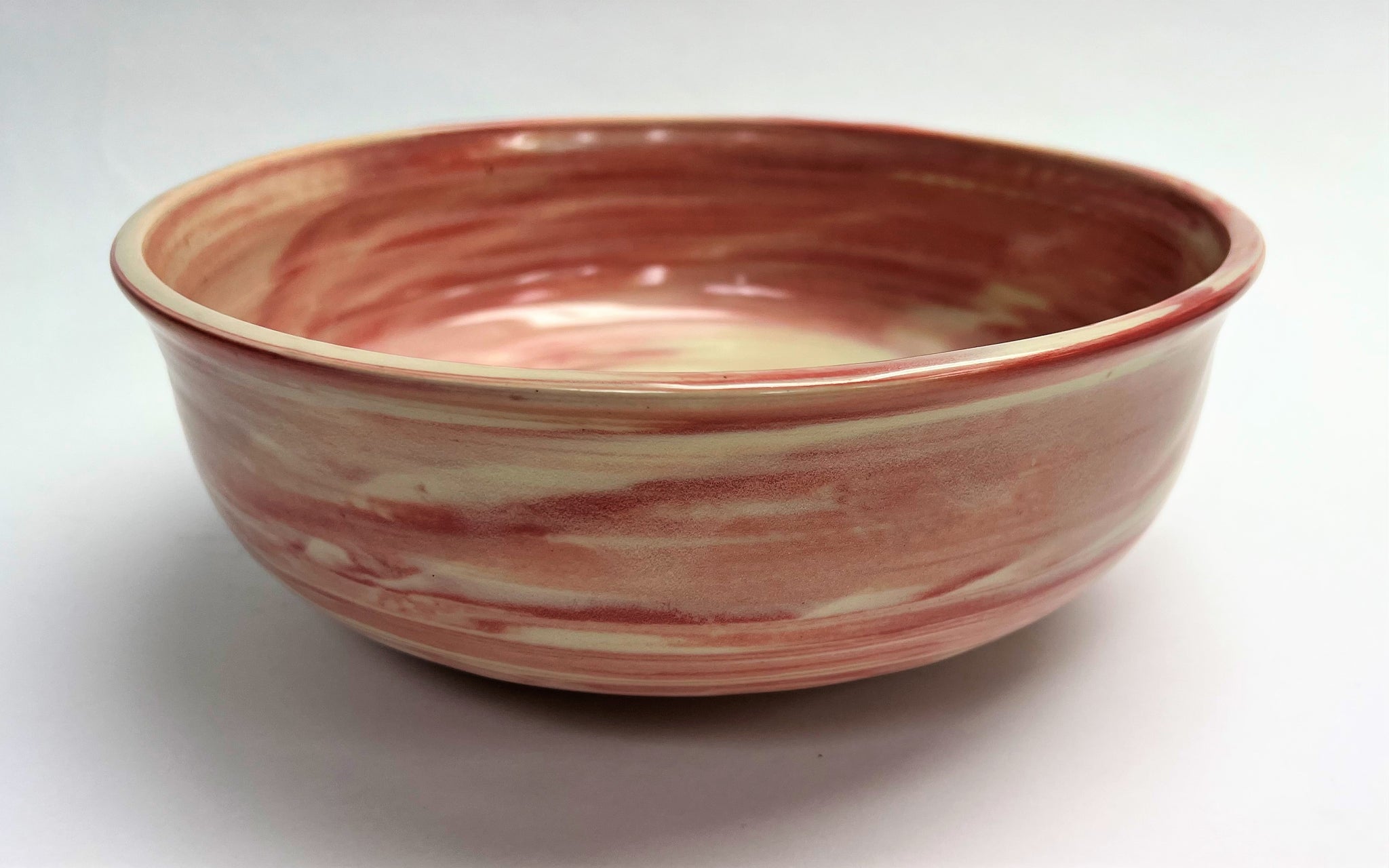 red ceramic fruit bowl