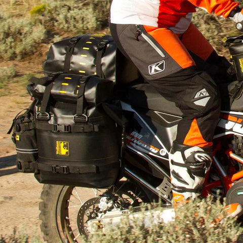 closeup of large luggage bags on the back of a motorcycle