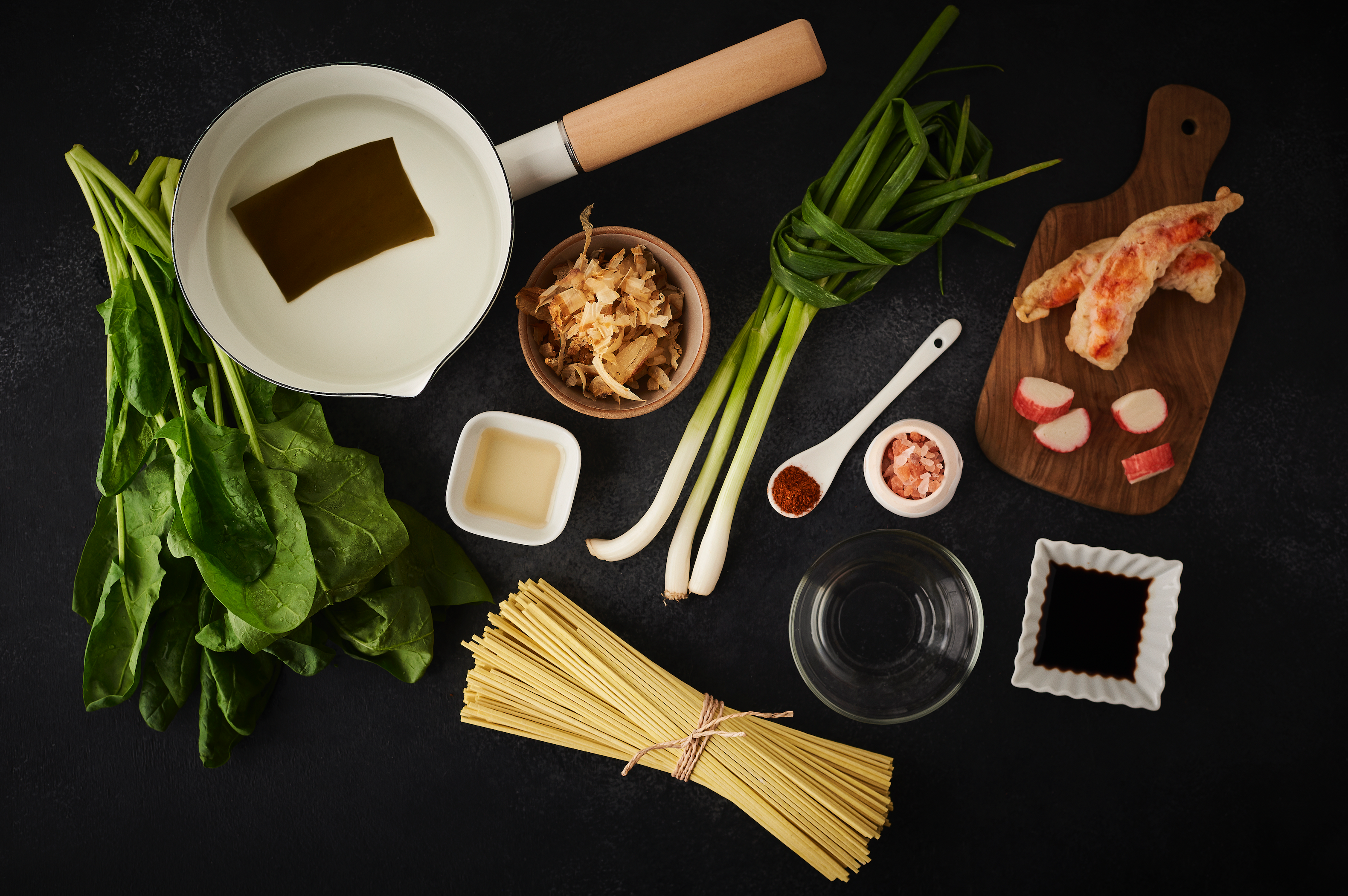 Ingredients laid out on table to make japanese soba noodle soup