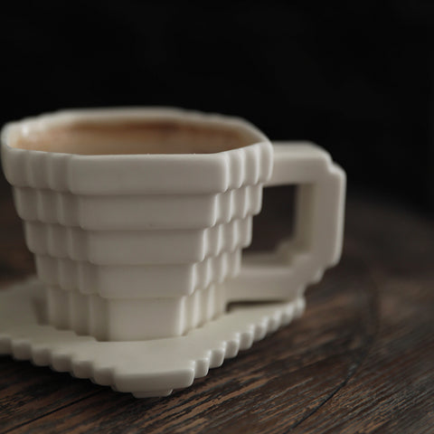 PIXELATED COFFEE CUP AND SAUCER