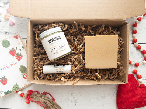 Photo of the You're the Balm Gift Set that includes a bar of Mr. Bee's soap, a jar of honey and tallow body balm and lip balm.