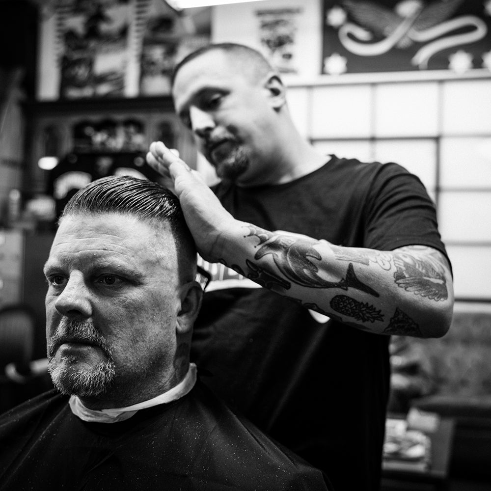 Eric Dressen getting a haircut