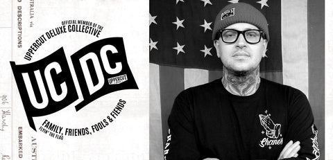 Corey Holt next to UCDC logo